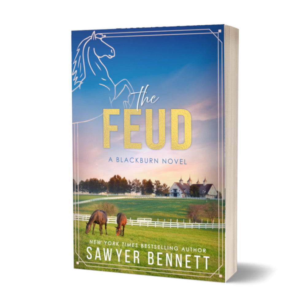 Contemporary romance paperback cover featuring a white horse barn on the green, rolling hills of Kentucky at sunset. The title of the book is The Feud by New York Times Bestselling Author Sawyer Bennett.