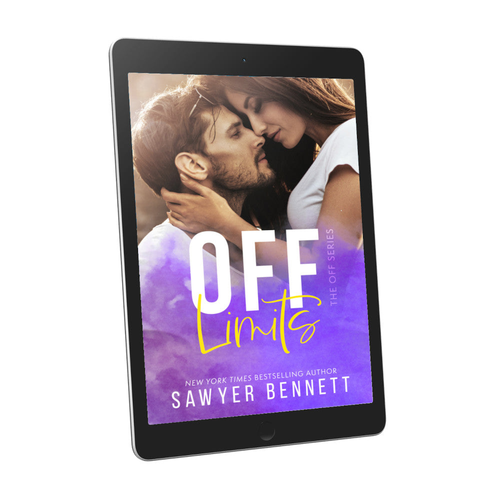 Contemporary romance book cover featuring an attractive couple in their mid-20’s embracing, displayed on an e-reader. The title of the book is Off Limits by New York Times Bestselling Author Sawyer Bennett.