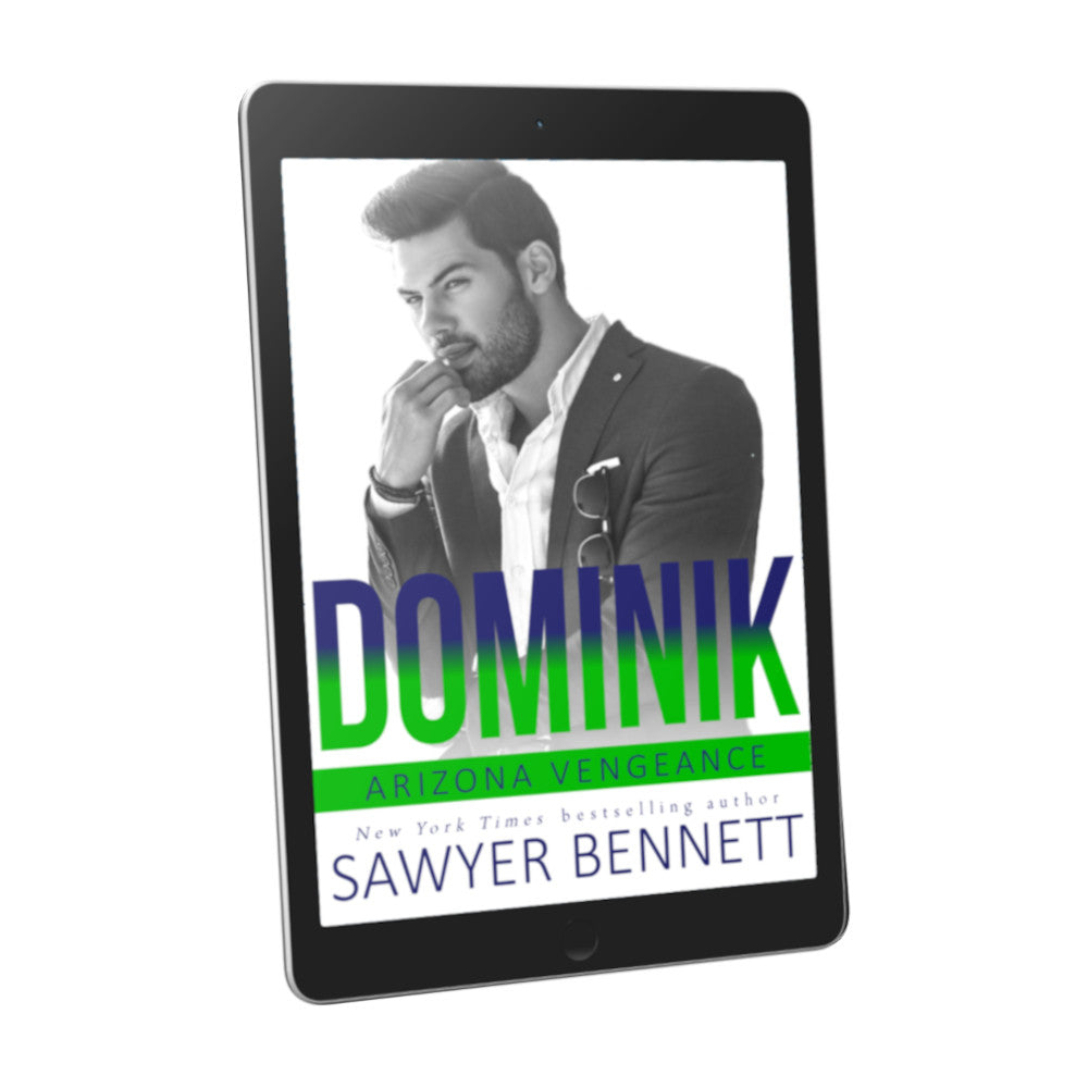 Hockey romance book cover featuring an attractive man with dark hair and a dark beard, wearing a black suit and white shirt open at the collar, displayed on an e-reader. The title of the book is Dominik by New York Times Bestselling Author Sawyer Bennett.