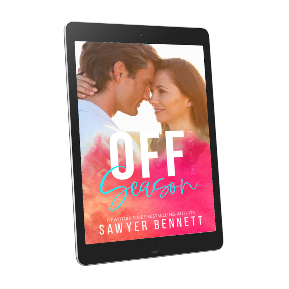Contemporary romance book cover featuring an attractive couple in their mid-20’s embracing, displayed on an e-reader. The title of the book is Off Season by New York Times Bestselling Author Sawyer Bennett.