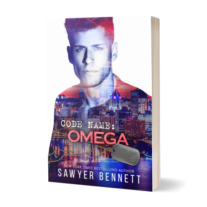 Romantic suspense paperback featuring an attractive man and city scape. The title of the book is Code Name: Omega by New York Times Bestselling Author Sawyer Bennett.