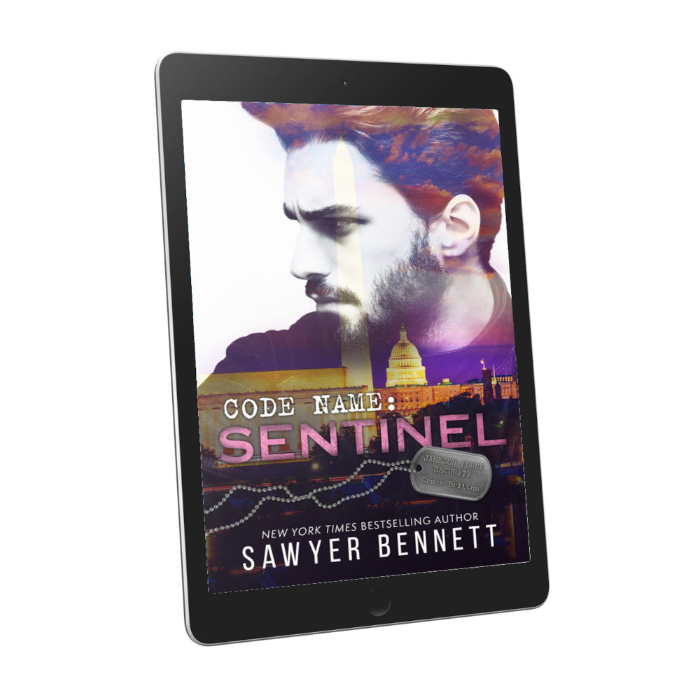 Romantic suspense book cover featuring an attractive man and city scape, displayed on an e-reader. The title of the book is Code Name: Sentinel by New York Times Bestselling Author Sawyer Bennett.