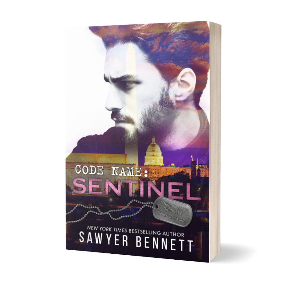 Romantic suspense paperback featuring an attractive man and city scape. The title of the book is Code Name: Sentinel by New York Times Bestselling Author Sawyer Bennett.