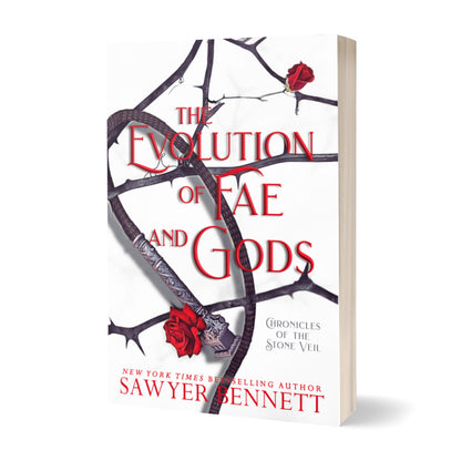 Fantasy romance paperback with thorned branches sprawled across a white background and a black leather whip with silver handle. The title of the book is The Evolution of Fae and Gods by New York Times Bestselling Author Sawyer Bennett.