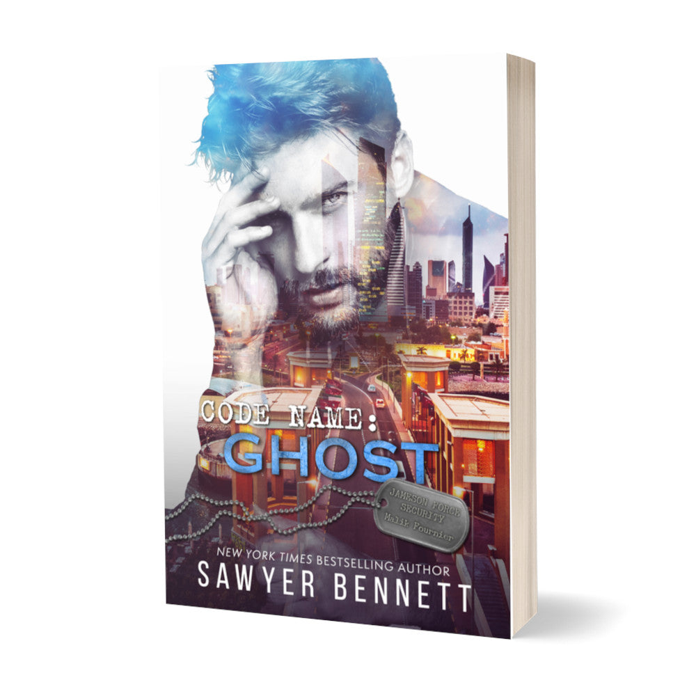 Romantic suspense paperback featuring an attractive man and city scape. The title of the book is Code Name: Ghost by New York Times Bestselling Author Sawyer Bennett.