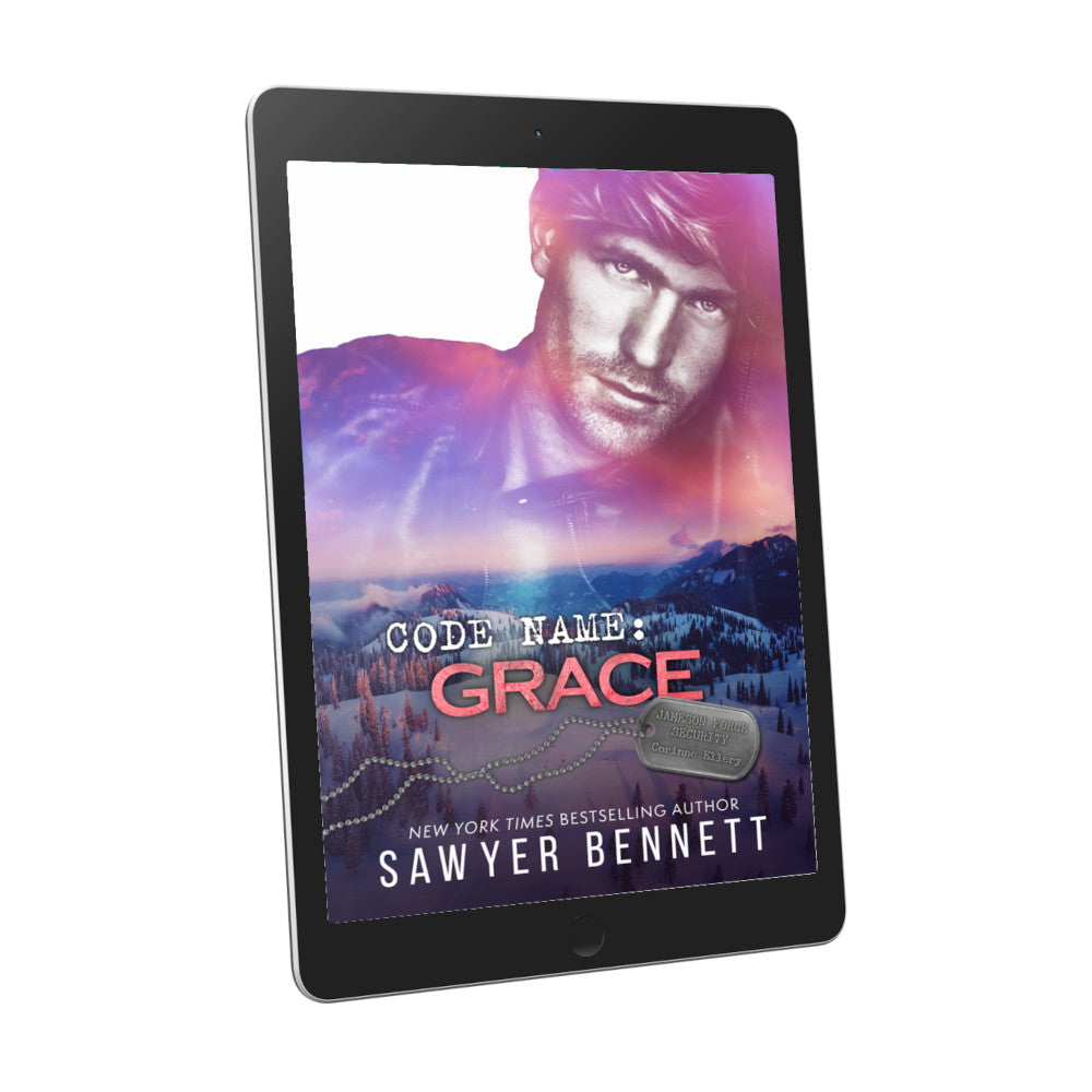 Romantic suspense book cover featuring an attractive man and snowy mountainscape, displayed on an e-reader. The title of the book is Code Name: Grace by New York Times Bestselling Author Sawyer Bennettt.