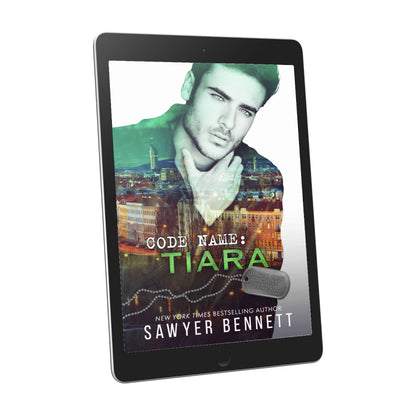 Romantic suspense book cover featuring an attractive man and city scape, displayed on an e-reader. The title of the book is Code Name: Tiara by New York Times Bestselling Author Sawyer Bennett.